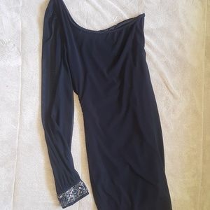 Black single sleeved form fitting evening dress